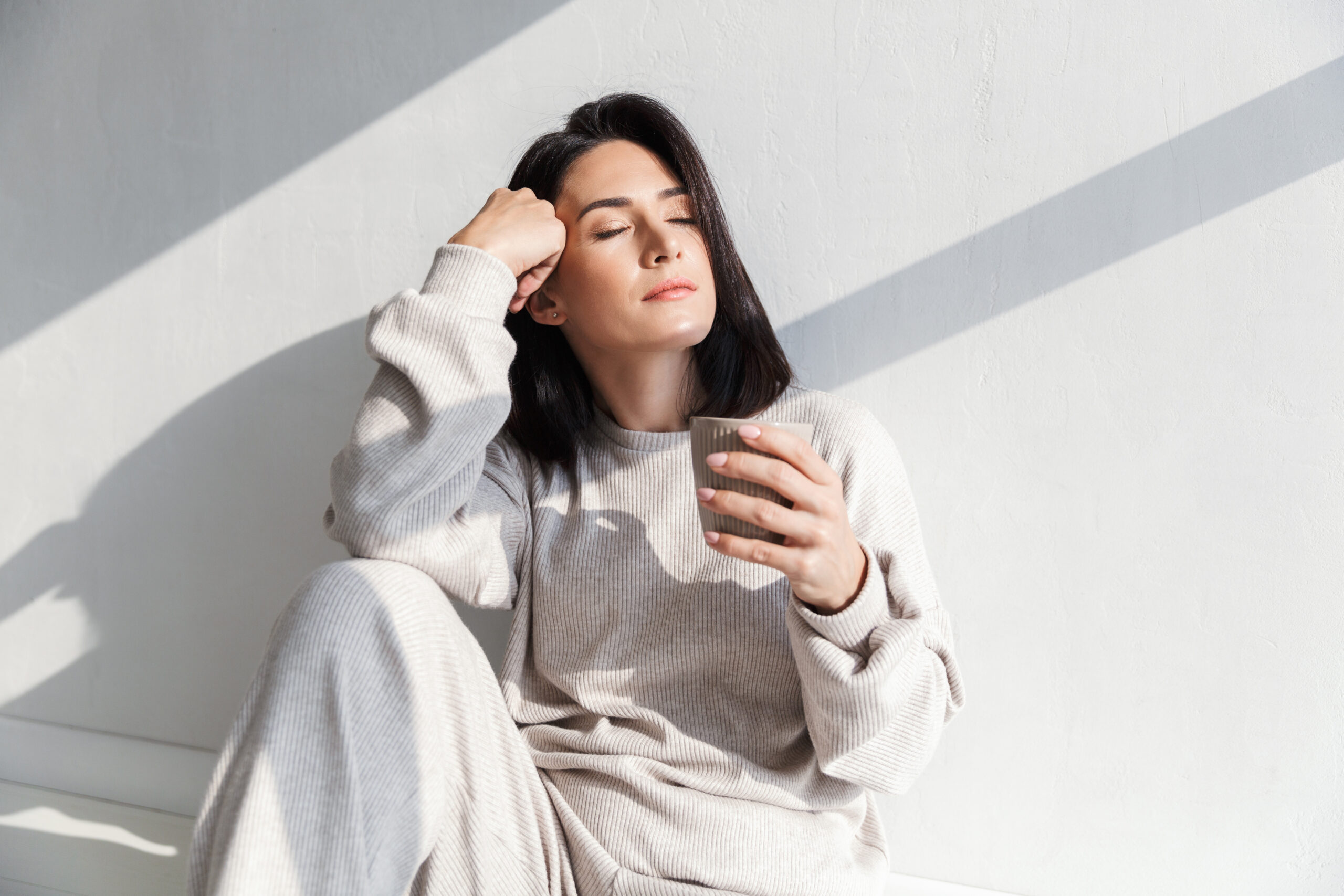 Image,Of,Beautiful,Woman,30s,Holding,Cup,With,Tea,While